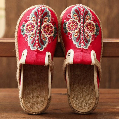 Women’s red embroidered linen slippers pair with floral motif and jute espadrille sole on Tampa Home & Garden Store