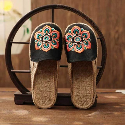 Women's black embroidered linen mules with colorful floral top and jute espadrille sole, pair on Tampa Home & Garden Store