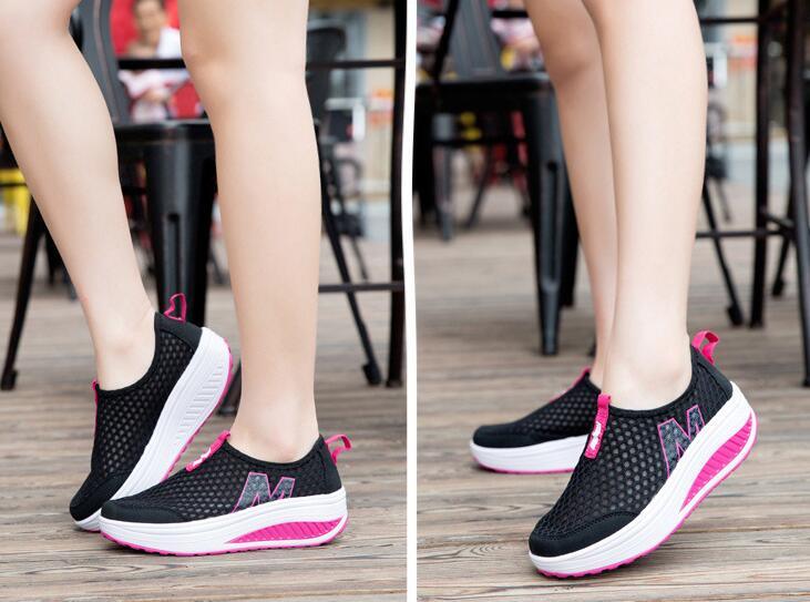 Stevvex women's mesh sneakers black upper with pink accents and white platform sole pair on Tampa Home & Garden Store