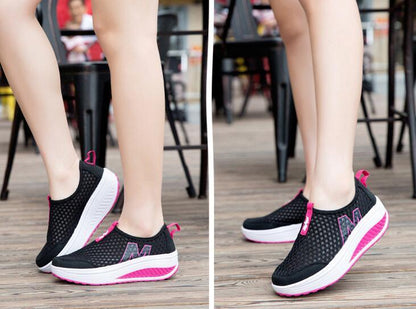 Stevvex women's mesh sneakers black upper with pink accents and white platform sole pair on Tampa Home & Garden Store