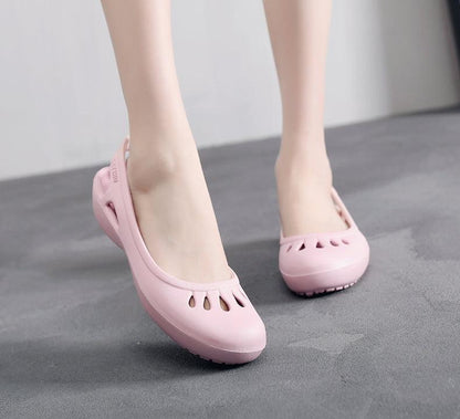 Pink Stevvex women's plastic clogs with vented toe and back strap waterproof indoor garden shoes on Tampa Home & Garden Store