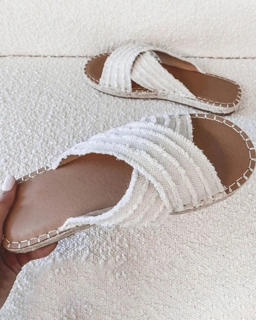 Stevvex two white knotted cross-strap flat sandals with open toe and tan footbed on Tampa Home & Garden Store