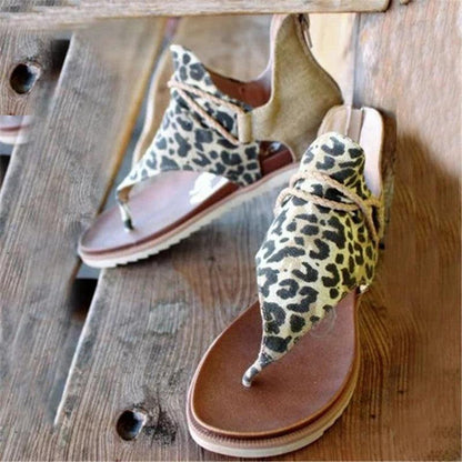 Women flat sandals Stevvex leopard print open-toe T-strap pair with back zipper on brown footbeds on Tampa Home & Garden Store