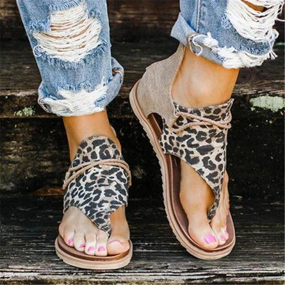 Women leopard print flat sandals with open toe, back zipper and cross-strap T-strap on Tampa Home & Garden Store
