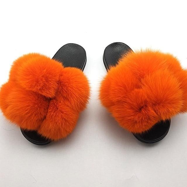Stevvex women's orange fluffy faux fur slides with black soles pair on Tampa Home & Garden Store