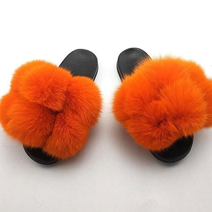 Stevvex women's orange fluffy faux fur slides with black soles pair on Tampa Home & Garden Store