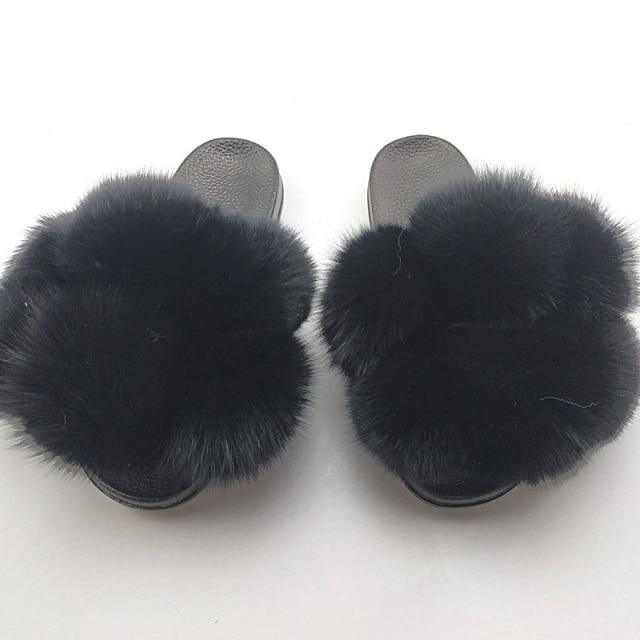 Women fluffy faux fur slides by Stevvex, black pair with plush fur straps on Tampa Home & Garden Store
