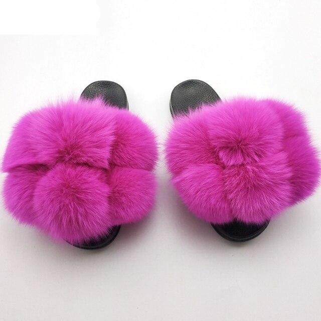 Women Fluffy Faux Fur Slides by Stevvex pair in bright pink with black soles on Tampa Home & Garden Store