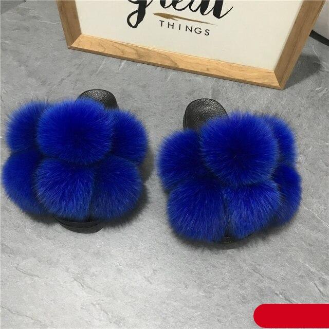Stevvex women's fluffy faux fur slides royal blue with black soles pair on Tampa Home & Garden Store