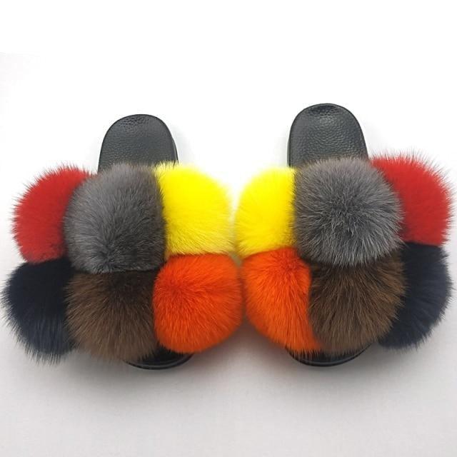 Pair of Stevvex women fluffy faux fur slides with colorful pom-pom straps on Tampa Home & Garden Store