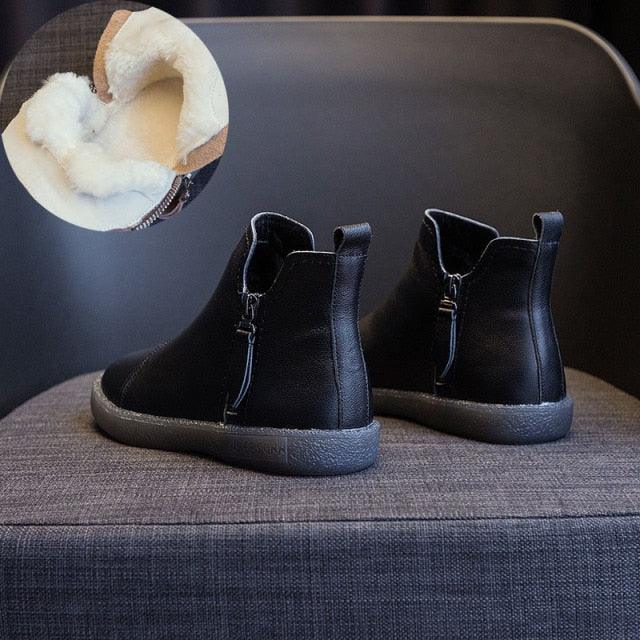Women black leather ankle boots with warm fur lining, side zipper, anti-slip sole, pair on Tampa Home & Garden Store