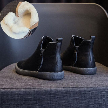 Women black leather ankle boots with warm fur lining, side zipper, anti-slip sole, pair on Tampa Home & Garden Store