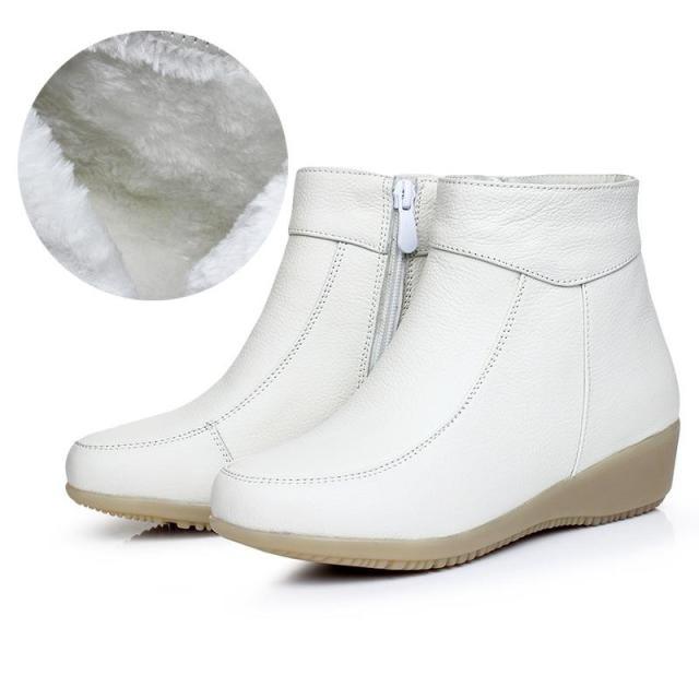 Stevvex white leather ankle boots with warm fur lining and side zipper, wedge sole pair on Tampa Home & Garden Store