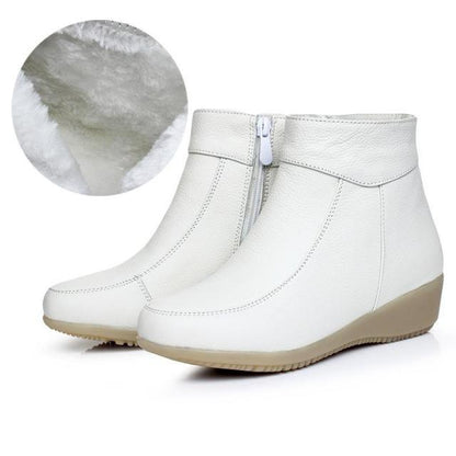 Stevvex white leather ankle boots with warm fur lining and side zipper, wedge sole pair on Tampa Home & Garden Store