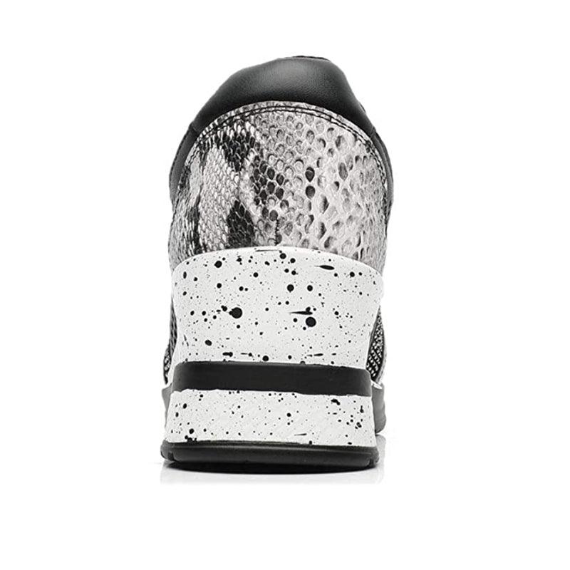 Women height-increasing sneakers by Stevvex with silver snake-print upper and white midsole on Tampa Home & Garden Store