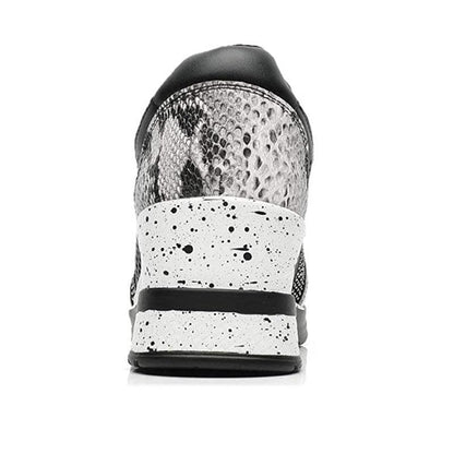 Women height-increasing sneakers by Stevvex with silver snake-print upper and white midsole on Tampa Home & Garden Store