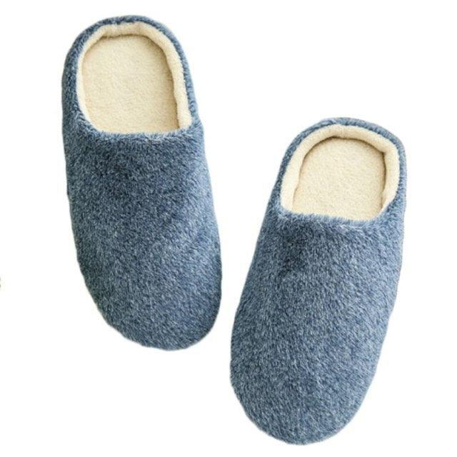 Blue plush indoor slippers with cream fleece lining, pair of soft home footwear on Tampa Home & Garden Store