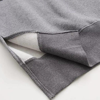 Women loose long gray hoodie with ribbed cuffs and white fleece lining on Tampa Home & Garden Store
