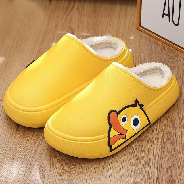 Yellow EVA slip-on slippers pair with plush lining and duck graphic on the side on Tampa Home & Garden Store