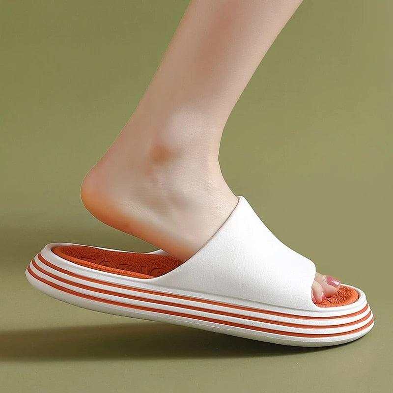 White EVA slide sandal with orange striped platform sole open toe on Tampa Home & Garden Store