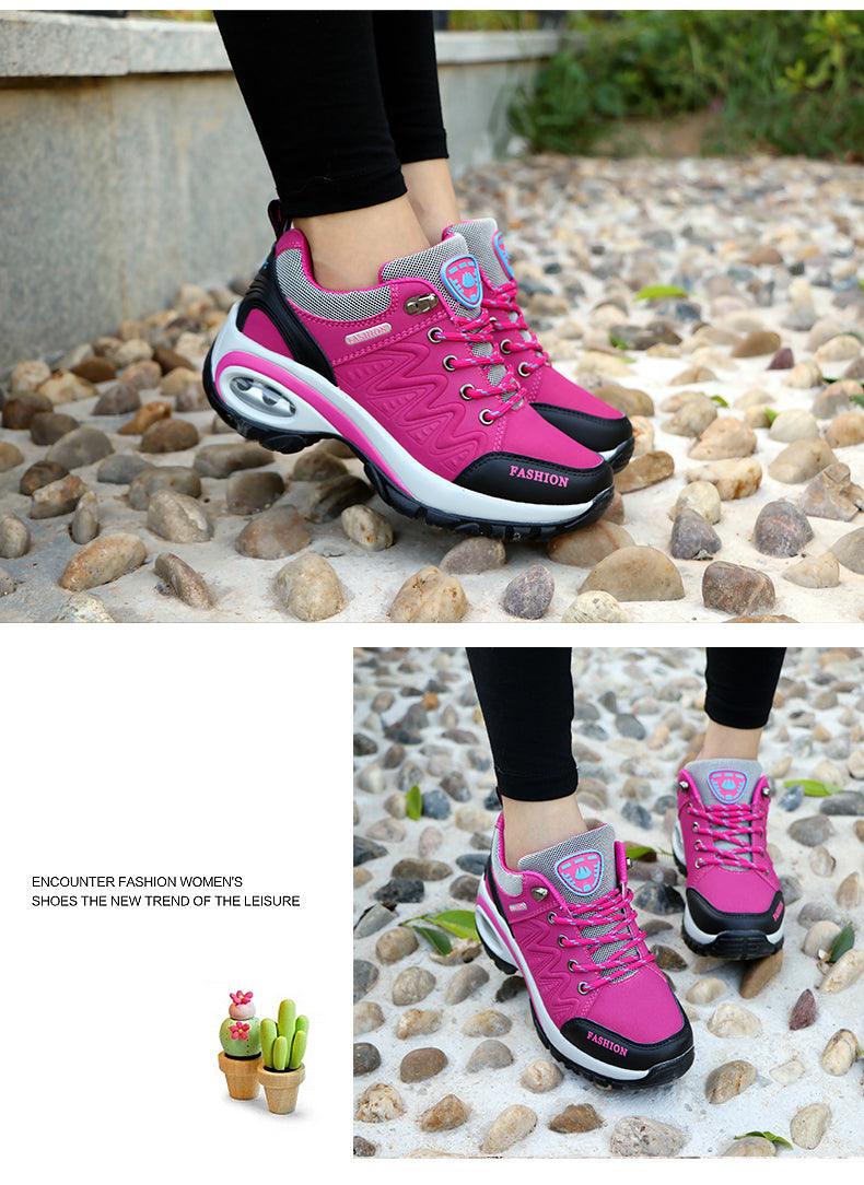 Women's pink mesh athletic sneakers by Stevvex with lace-up and air cushion sole on rocky path on Tampa Home & Garden Store
