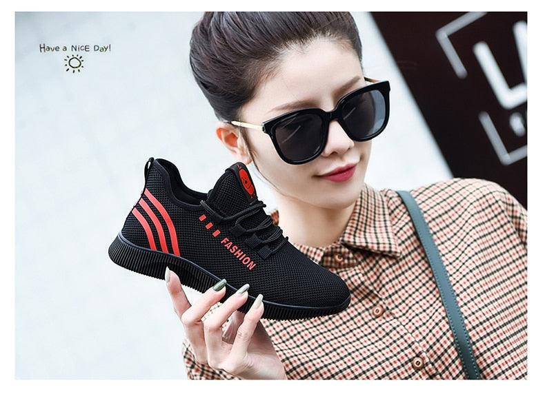 Women running shoes Stevvex, black Air Mesh sneakers with red stripes, athletic footwear on Tampa Home & Garden Store