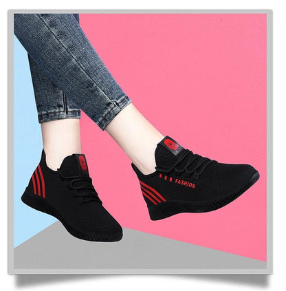 Women running shoes black breathable mesh with red accents and FASHION text on Tampa Home & Garden Store