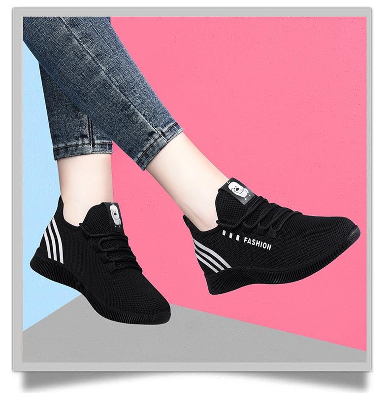 Women running shoes Stevvex air mesh breathable black sneakers pair with white stripes on Tampa Home & Garden Store