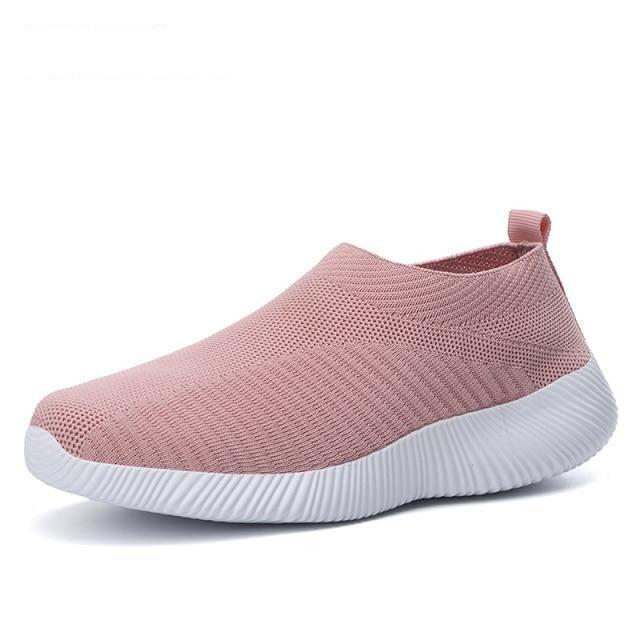 Women's pink knitted slip-on sneaker with breathable mesh upper and white sole on Tampa Home & Garden Store