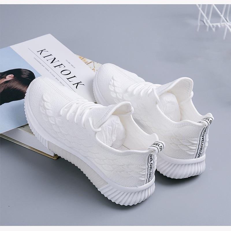 Stevvex white women running sneakers ST85SH0704AVH with breathable knit and non-slip sole on Tampa Home & Garden Store