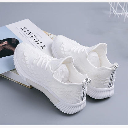 Stevvex white women running sneakers ST85SH0704AVH with breathable knit and non-slip sole on Tampa Home & Garden Store