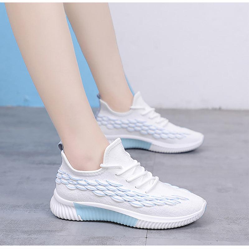 Stevvex Women Running Sneakers ST85SH0704AVH white knit upper with blue sole accents pair on Tampa Home & Garden Store