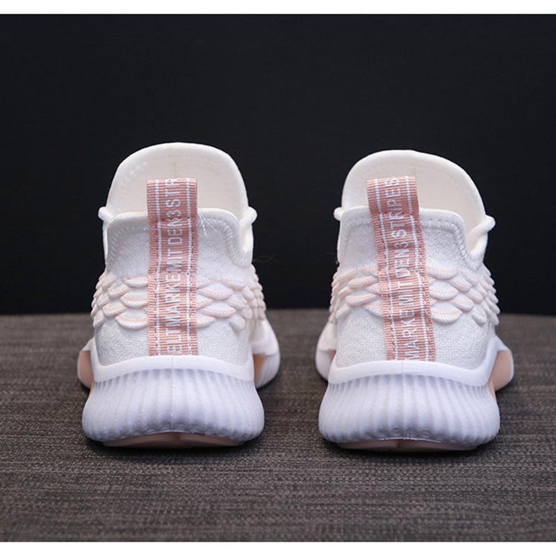 Stevvex women’s running sneakers white knit upper with pink pull-tab back, pair on Tampa Home & Garden Store