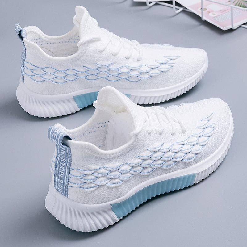 Sneakers Stevvex white knit with blue wave stitching, light blue accents, pair on Tampa Home & Garden Store