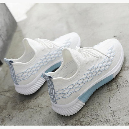 Stevvex white knit running sneakers pair with lattice pattern and light blue sole on Tampa Home & Garden Store