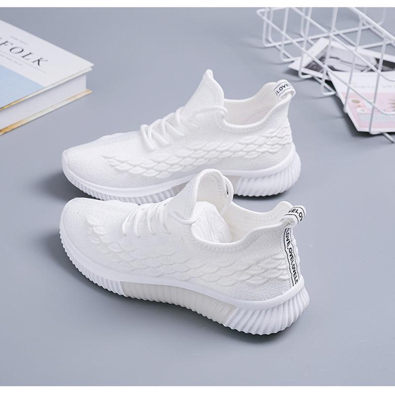 Women running sneakers Stevvex white breathable knit upper non-slip sole pair on Tampa Home & Garden Store