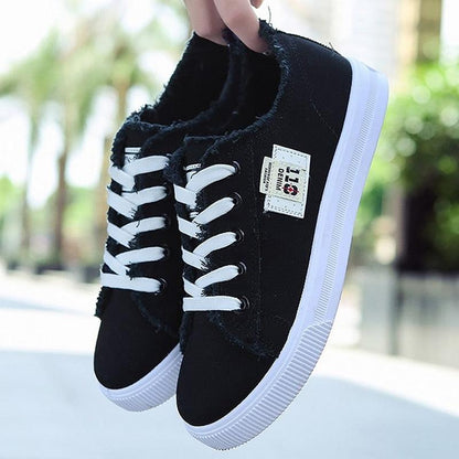 Women's Stevvex black canvas sneakers, pair with white laces and white sole, low-top sneakers on Tampa Home & Garden Store
