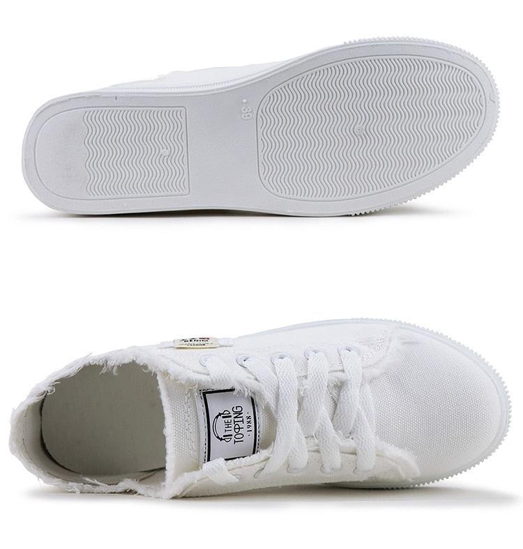 White canvas sneakers, low-top lace-up, Stevvex casual shoes with textured outsole on Tampa Home & Garden Store