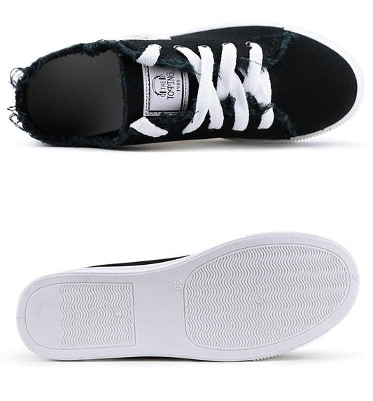 Stevvex women's canvas sneakers black low-top with white laces; top and outsole views (2) on Tampa Home & Garden Store