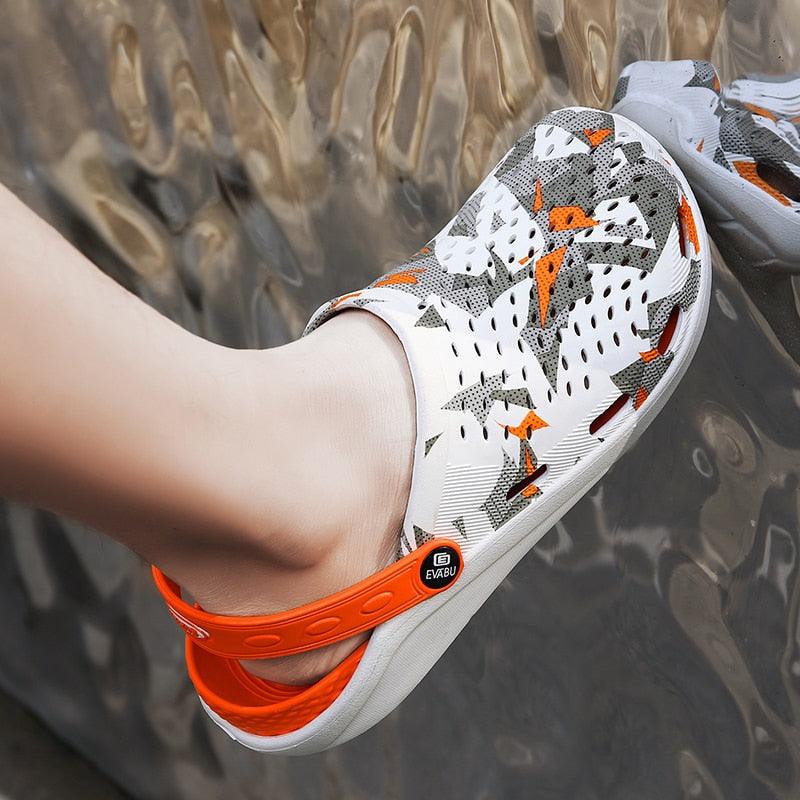 Women's slip-on sandals with white camo-pattern upper and orange heel strap, breathable lightweight clogs on Tampa Home & Garden Store