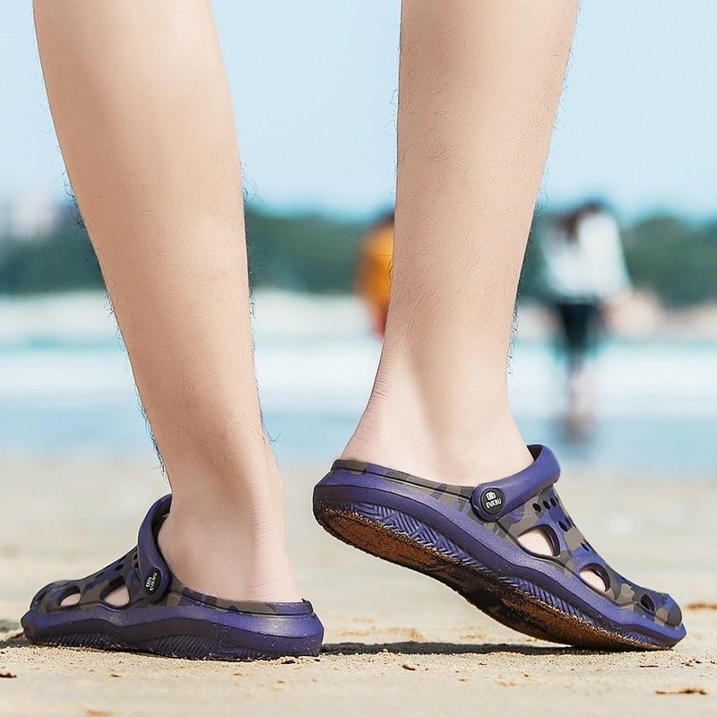 Stevvex women's breathable purple clogs sandals pair with cutout openings on beach on Tampa Home & Garden Store