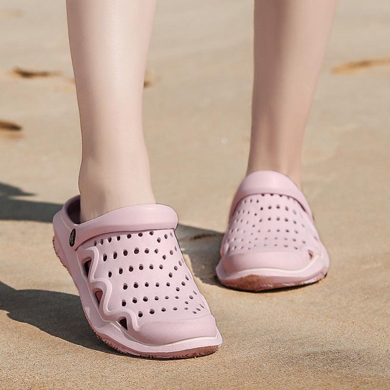 Stevvex women's breathable slip-on pink clogs on sandy beach on Tampa Home & Garden Store