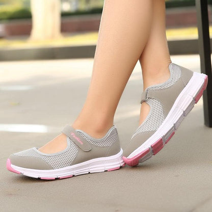Stevvex women's mesh walking sneakers gray pair with pink sole breathable strap closure on Tampa Home & Garden Store