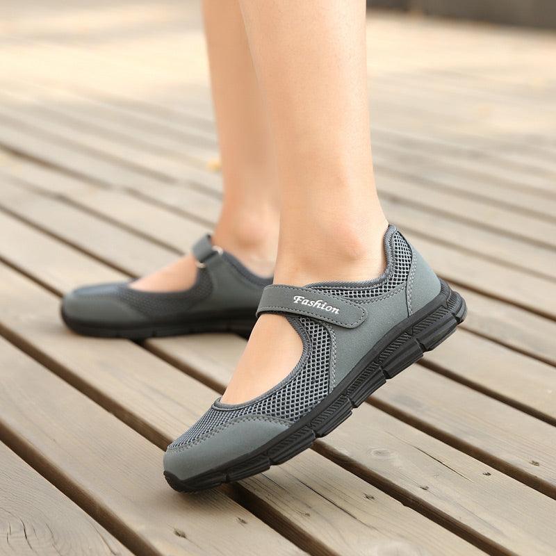 Stevvex women's breathable mesh walking sneakers with gray strap and chunky black sole on Tampa Home & Garden Store