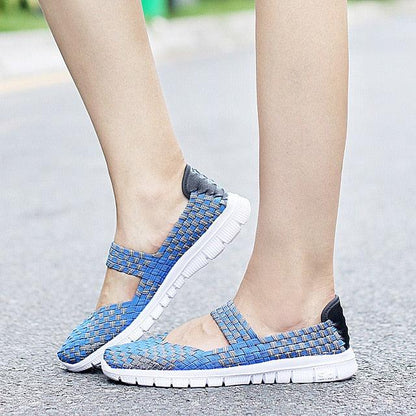Women’s blue woven espadrille sneakers with white sole and back heel tab on Tampa Home & Garden Store
