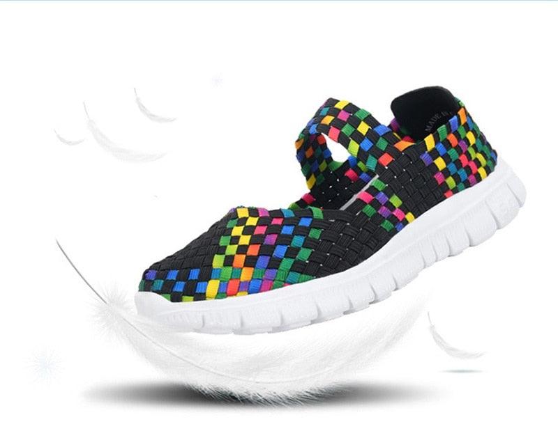 Women's Stevvex espadrille sneakers with colorful woven rainbow upper and white sole on Tampa Home & Garden Store