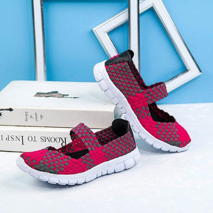 Stevvex women's breathable mesh slip-on espadrille sneakers in pink and gray, pair shown on Tampa Home & Garden Store