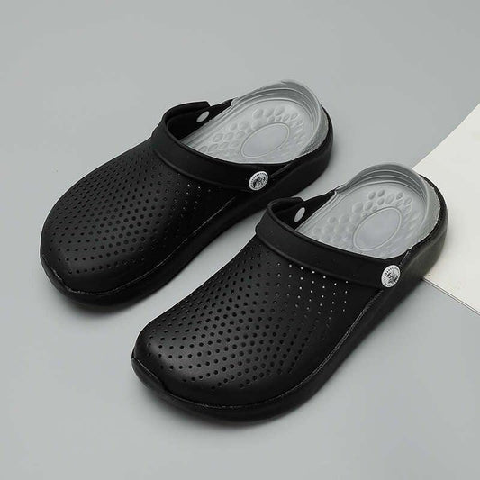 Stevvex pair of black perforated clog slippers with strap, lightweight non-slip sandals on Tampa Home & Garden Store