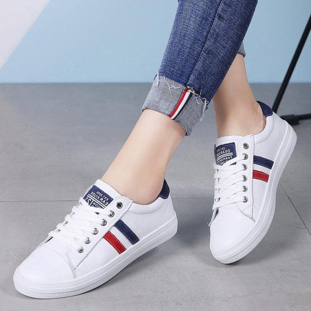 Stevvex women's white leather sneakers with navy red side stripes, casual vulcanized sole pair on Tampa Home & Garden Store