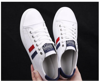 Women's Stevvex white leather sneakers with red navy stripe detail, casual white shoes pair on Tampa Home & Garden Store